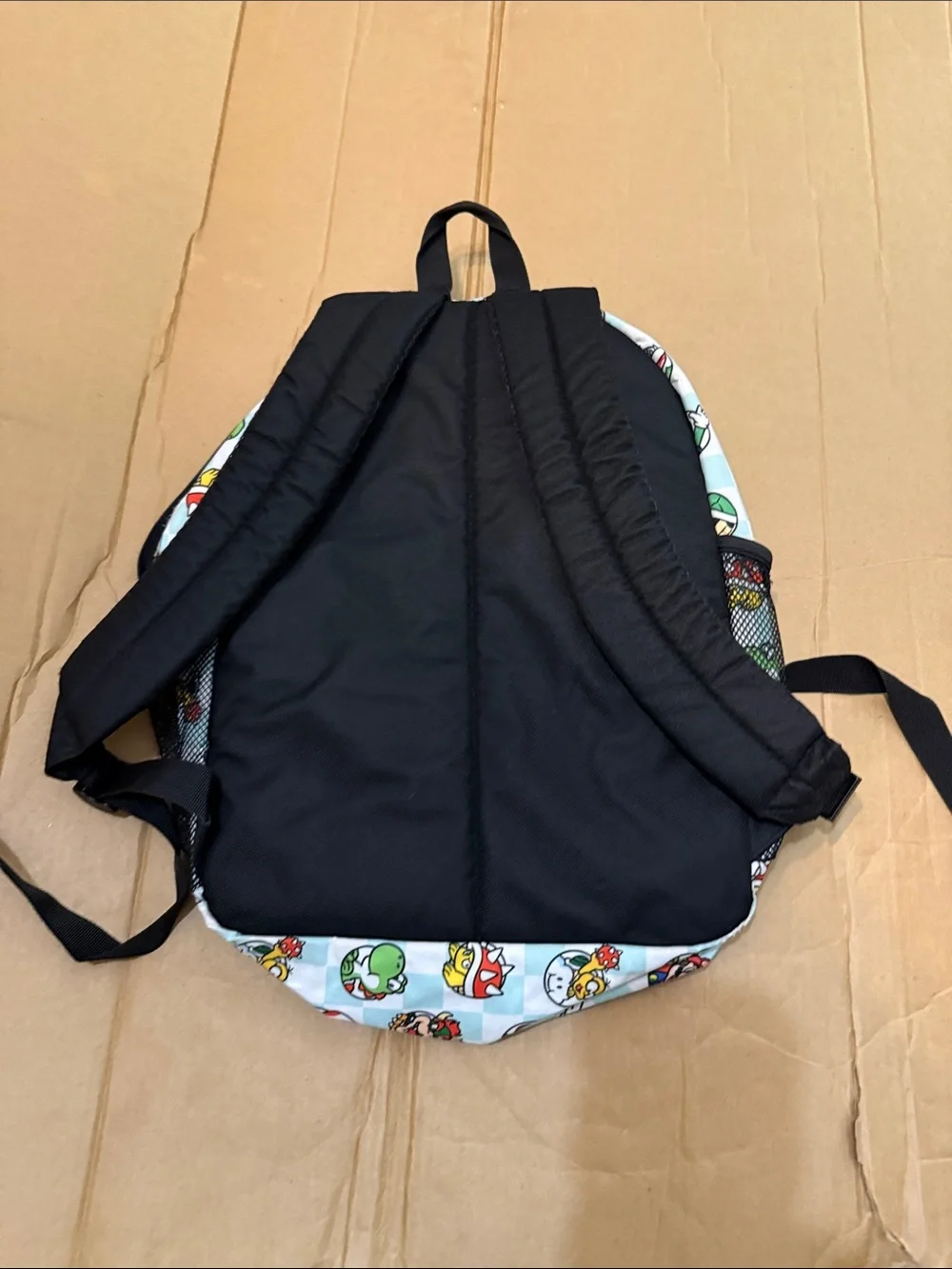 Nintendo Super Mario Kids Backpack in Light Blue and Black with Character Icons